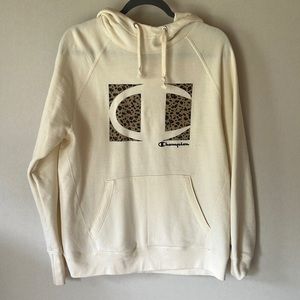 Champion Hoodie. Color ivory with leopard print. Size Large.